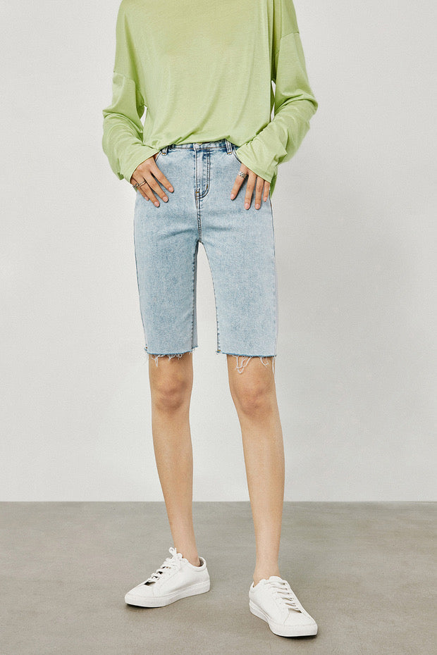 Raw Edge Midi Denim Shorts in Blue