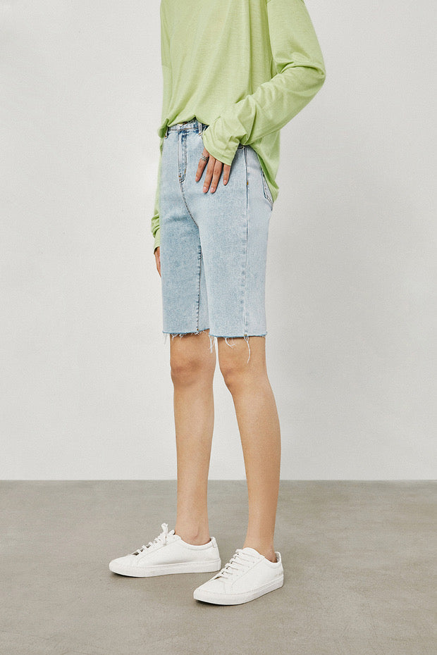 Raw Edge Midi Denim Shorts in Blue