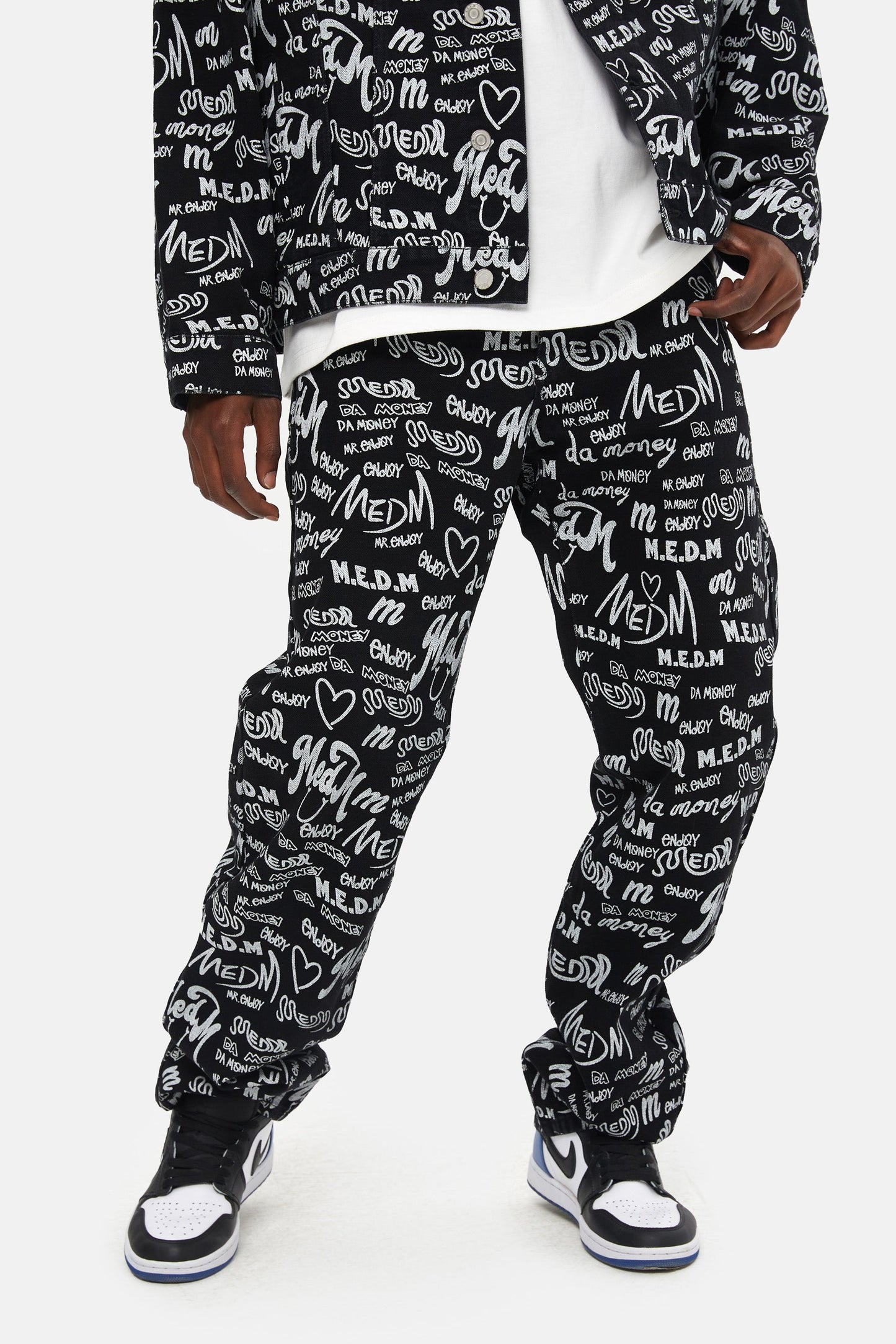 MEDM パターンプリント デニムパンツ