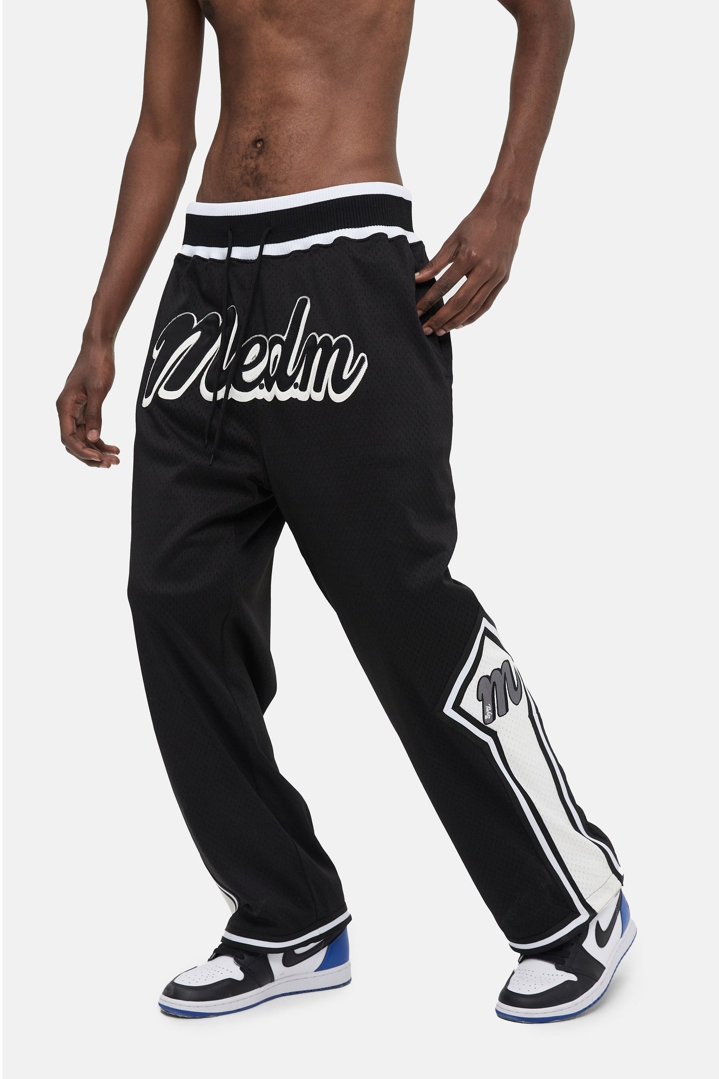 MEDM 刺繍ロゴパンツ