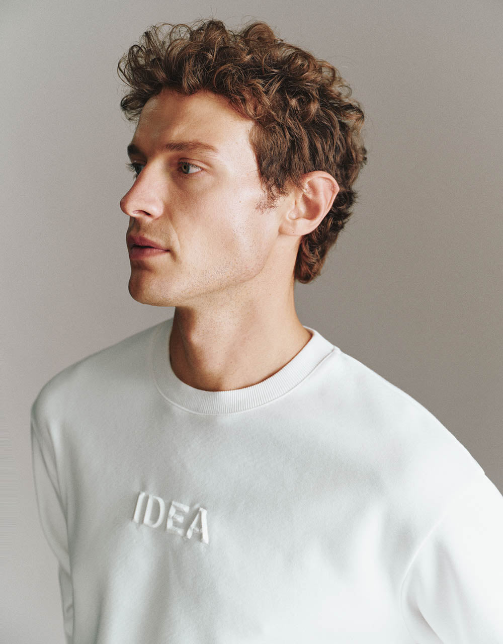 Letter Embossed Crew Neck Sweatshirt