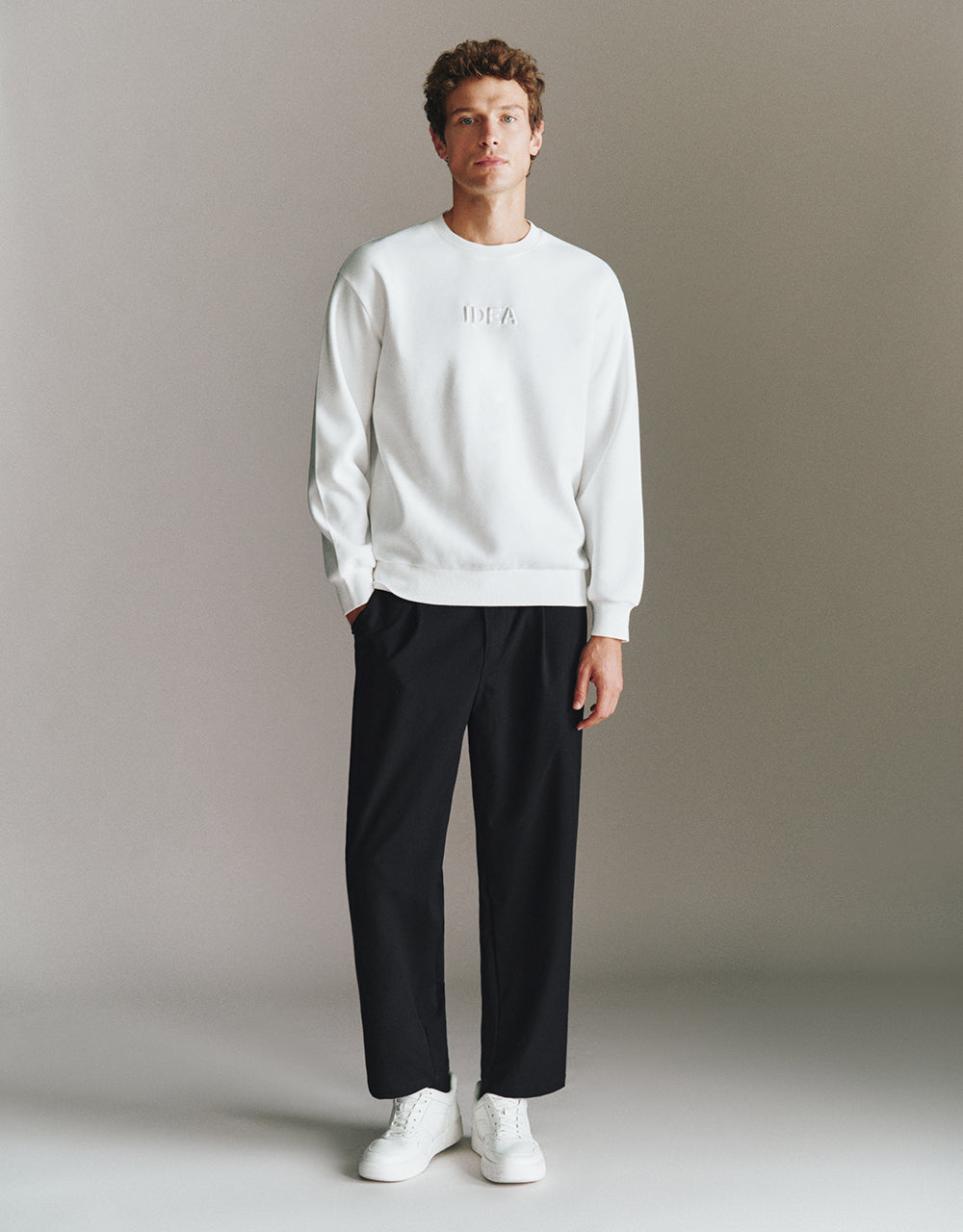Letter Embossed Crew Neck Sweatshirt