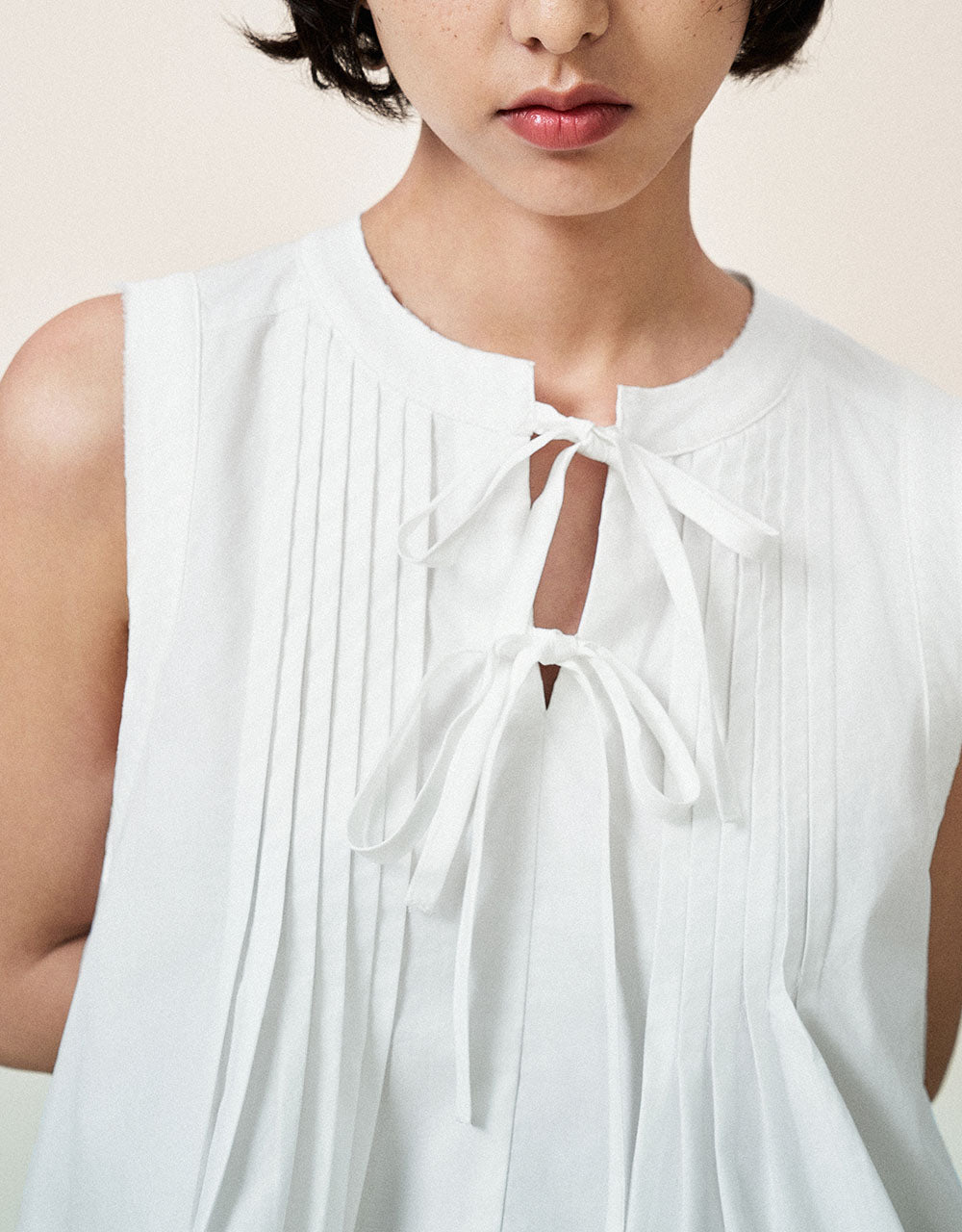 Sleeveless Tie Front Blouse